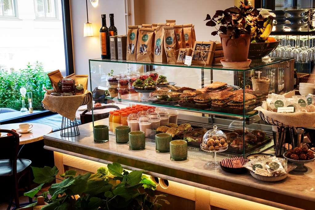 Villa Dagmar Стокхолм Ресторант снимка A display of coffee and pastries at a café in Stockholm, Sweden